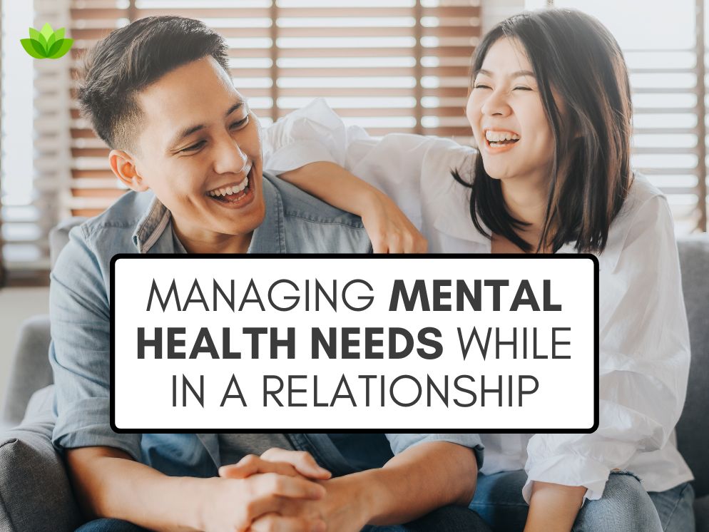 A graphic that reads "Managing Mental Health Needs While in a Relationship" in black text in a white text box, over a stock photo of a smiling Asian couple sitting together on a couch.